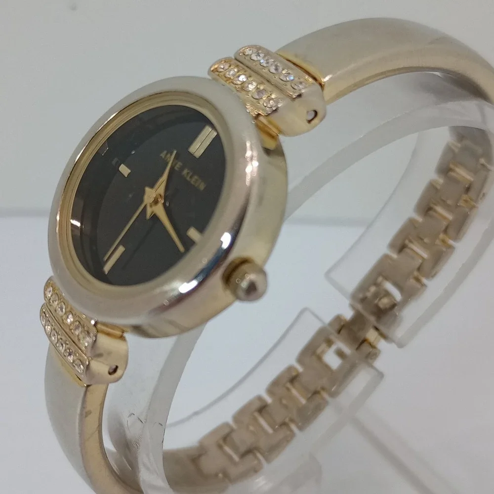 Anne Klein Women's Gold Tone AK/2474‎ Bangle Watch 24.1mm Black Dial New Battery